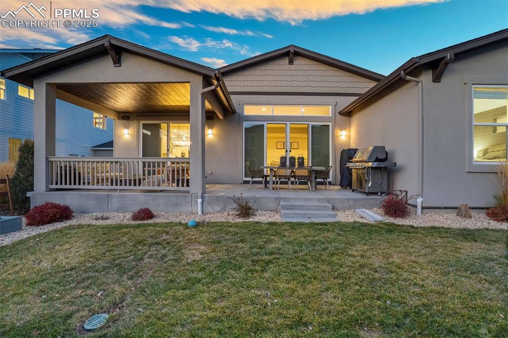 Image 44 of 50: Two sliding doors to back patio