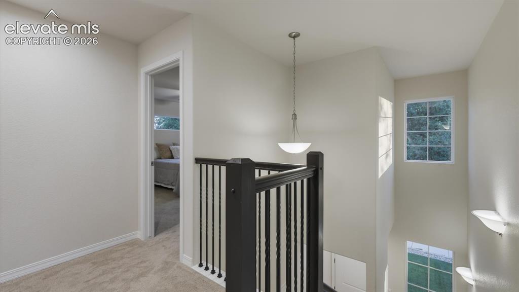 Image 18 of 50: View of the Front Entry from the Living Room.