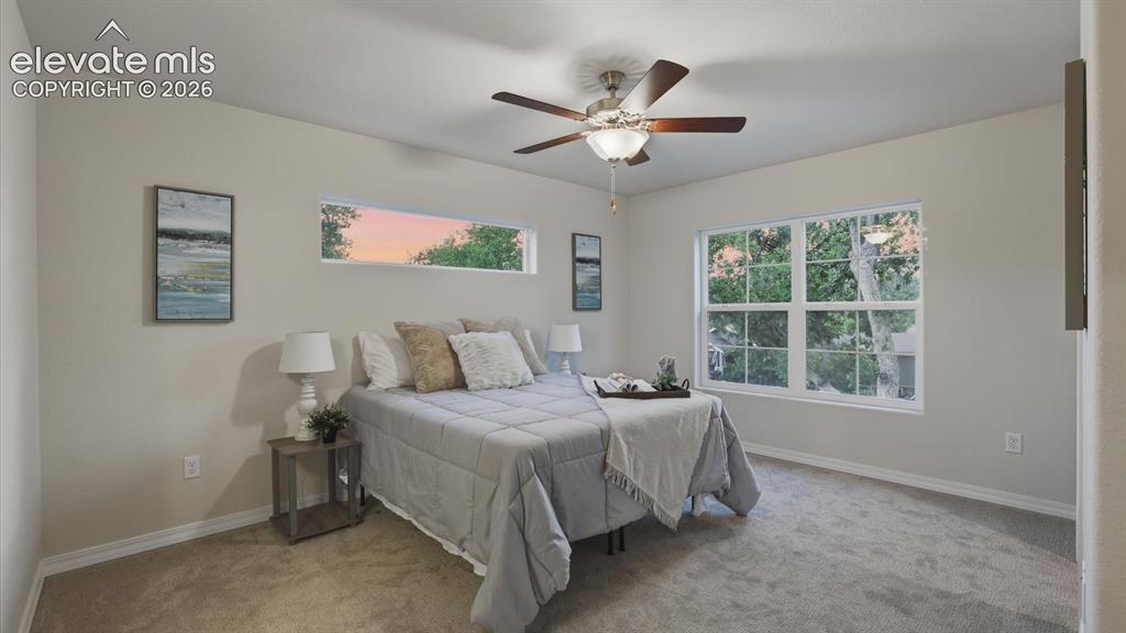 Image 19 of 50: Upper Level Landing and Entry into the Primary Bedroom Suite.