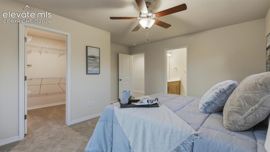 Image 21 of 50: The upper level Primary Suite features an adjoining private Shower Bathroom