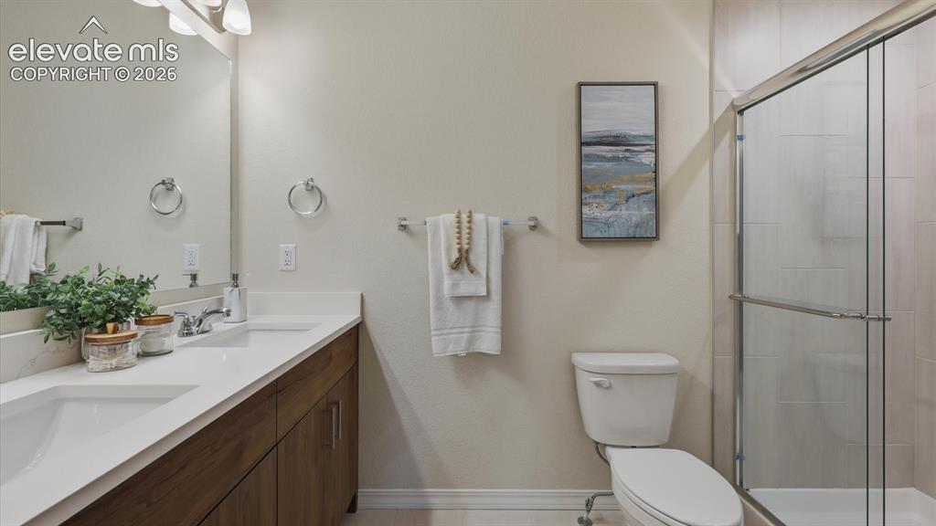 Image 22 of 50: The upper level Primary Suite also boasts a large walk in closet.