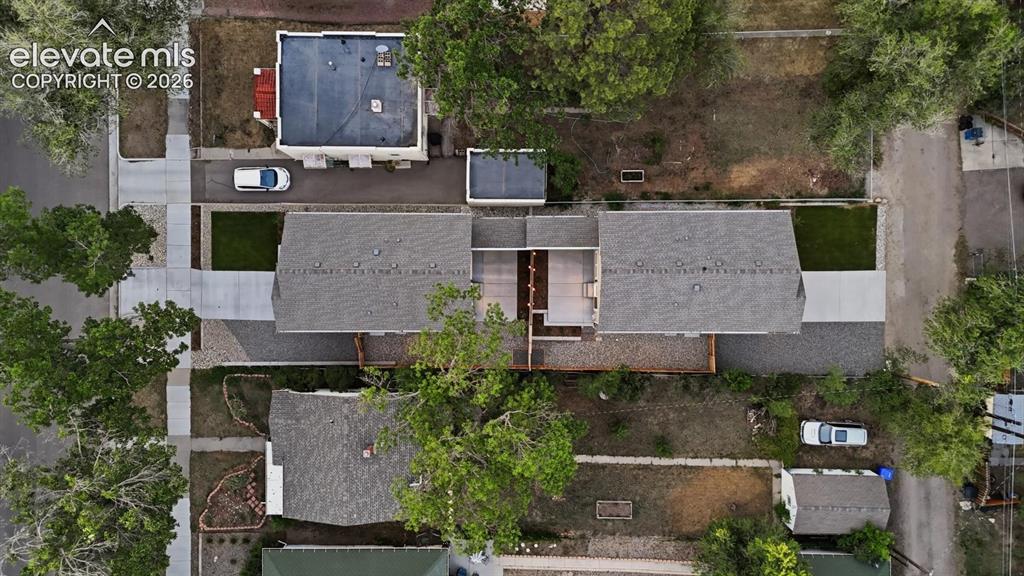 Image 3 of 50: Sunset aerial view of home and lot.