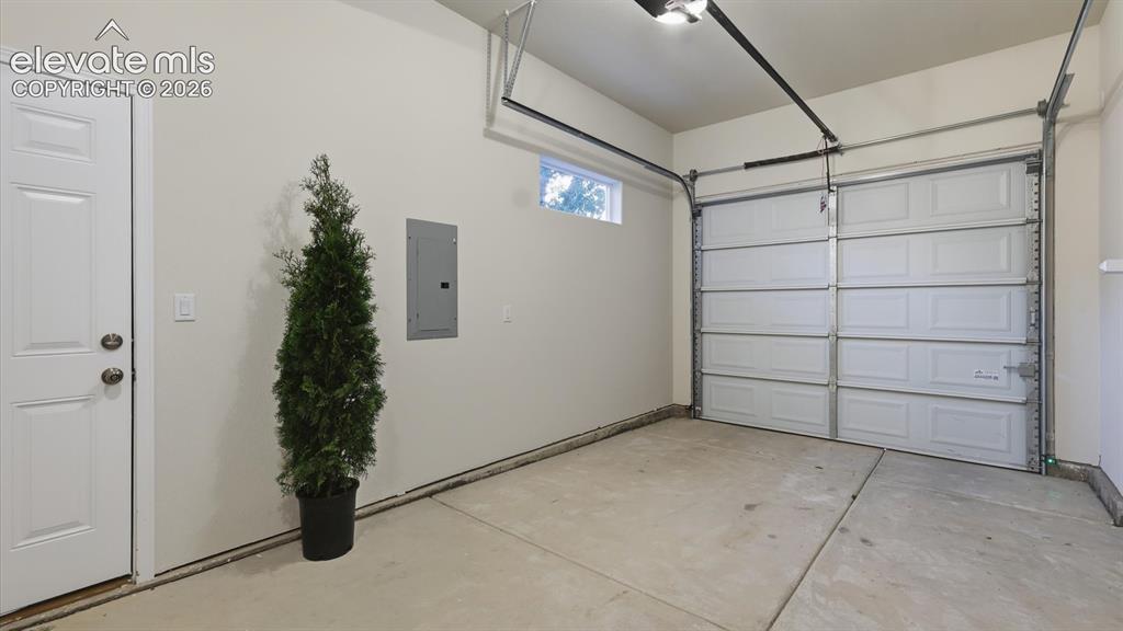 Image 33 of 50: Oversized 1-car finished, attached garage.