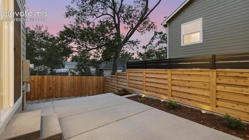Image 43 of 50: Dining Area with sliding door to the backyard patio.