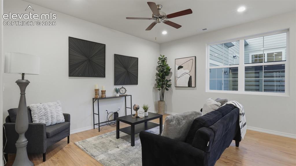 Image 9 of 50: Luxury vinyl plank flooring, recessed lighting, upgraded fixtures, & walkou