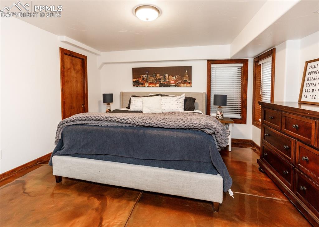 Image 37 of 50: Bedroom with baseboards