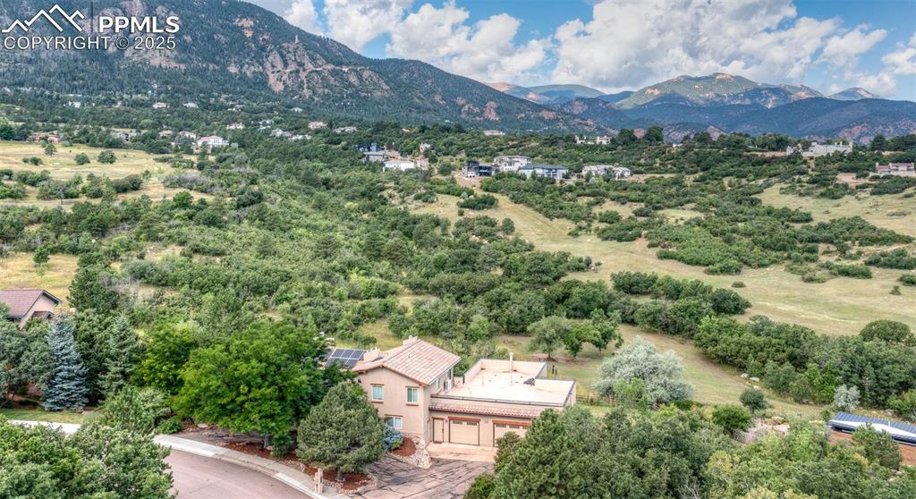 Image 48 of 50: View of subject property with mountains