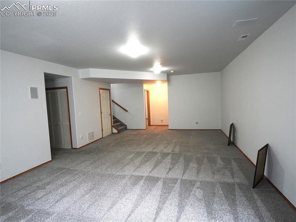 Image 38 of 49: basement living area 