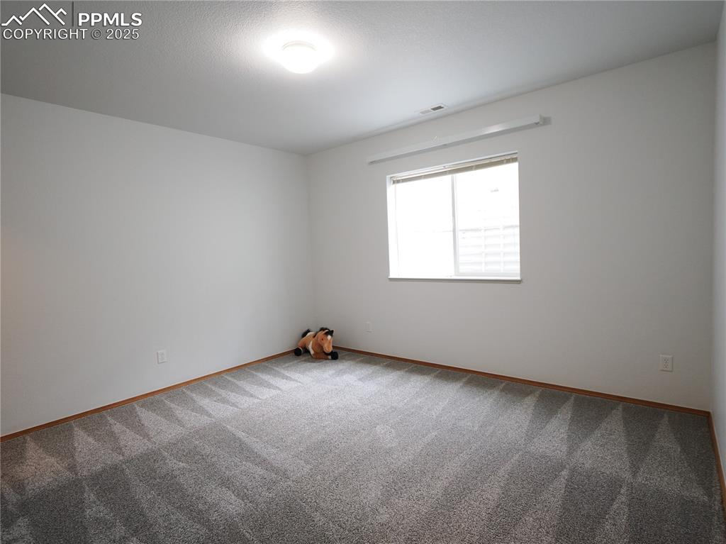 Image 40 of 49: NW basement bedroom