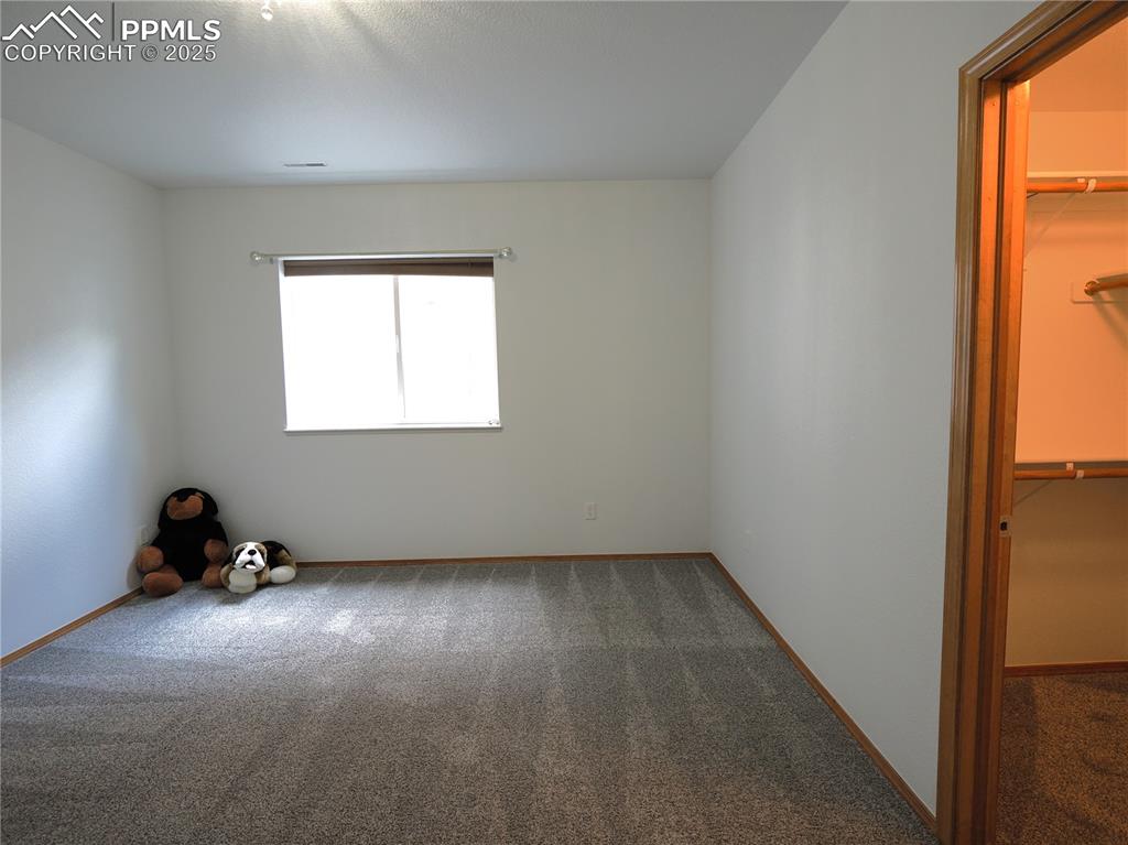 Image 42 of 49: SW basement bedroom 