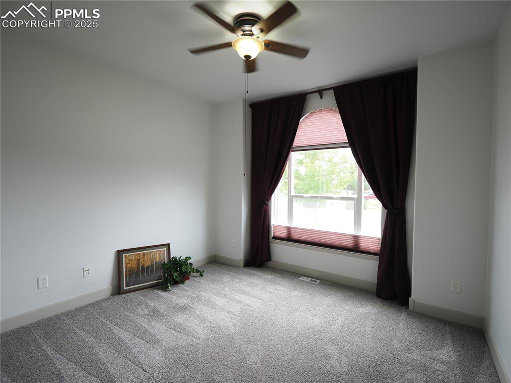 Image 5 of 49: bedroom or office facing the street 