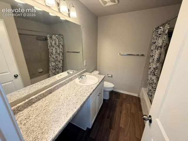 Image 32 of 42: Bathroom featuring a spacious vanity with an integrated sink, expansive mir