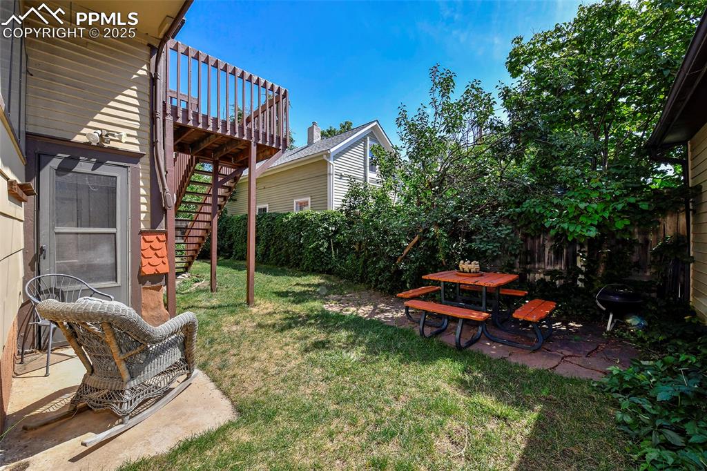 Image 20 of 42: Sip your morning coffee in the private garden!