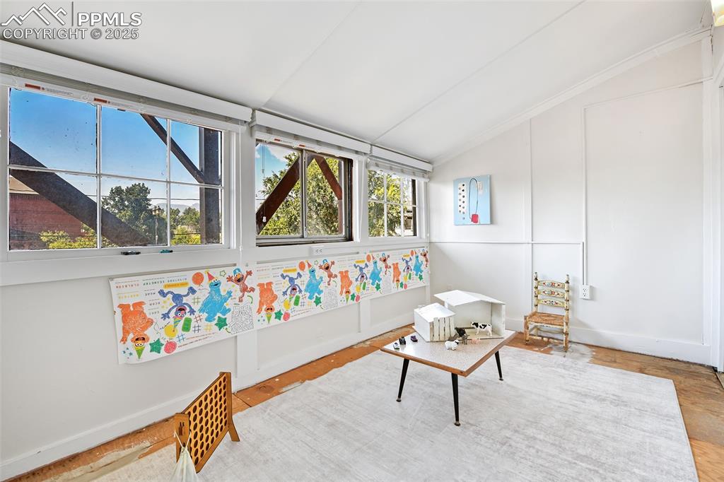 Image 31 of 42: Former TB Porch makes a fun playroom/bonus space
