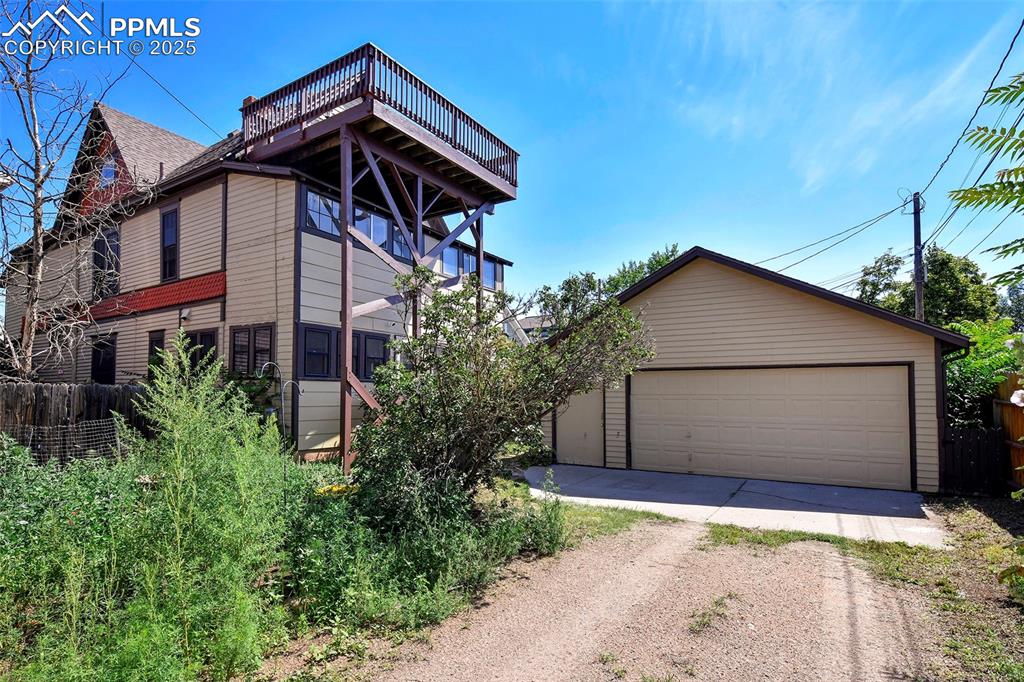 Image 37 of 42: Newly reinforced deck offers city views!
