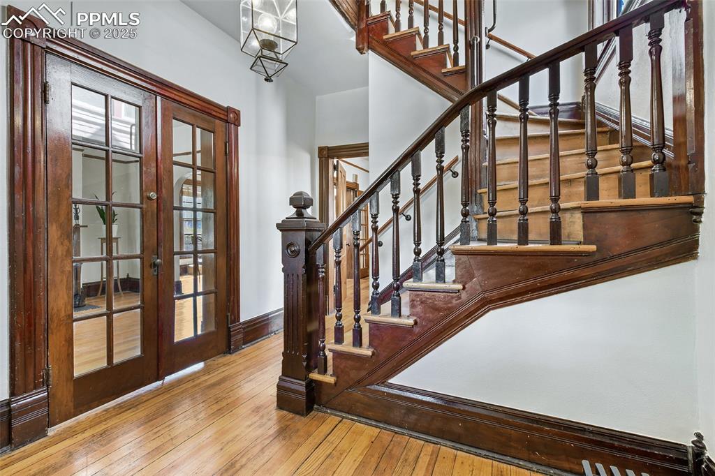 Image 9 of 42: Another set of French doors open to the Living Room
