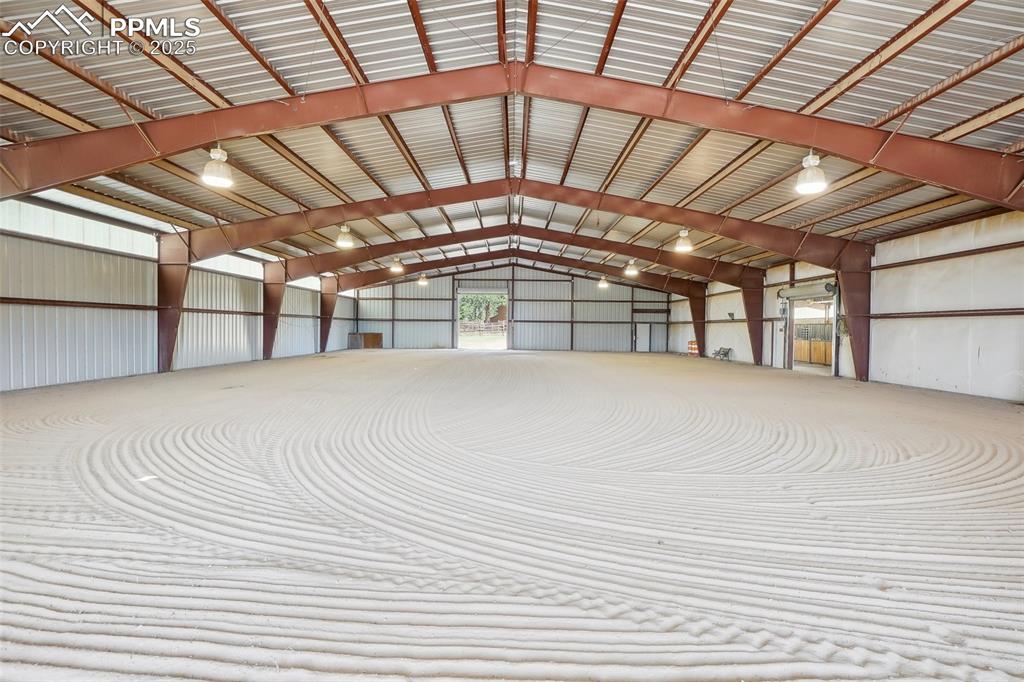 Image 34 of 49: Indoor arena with lights