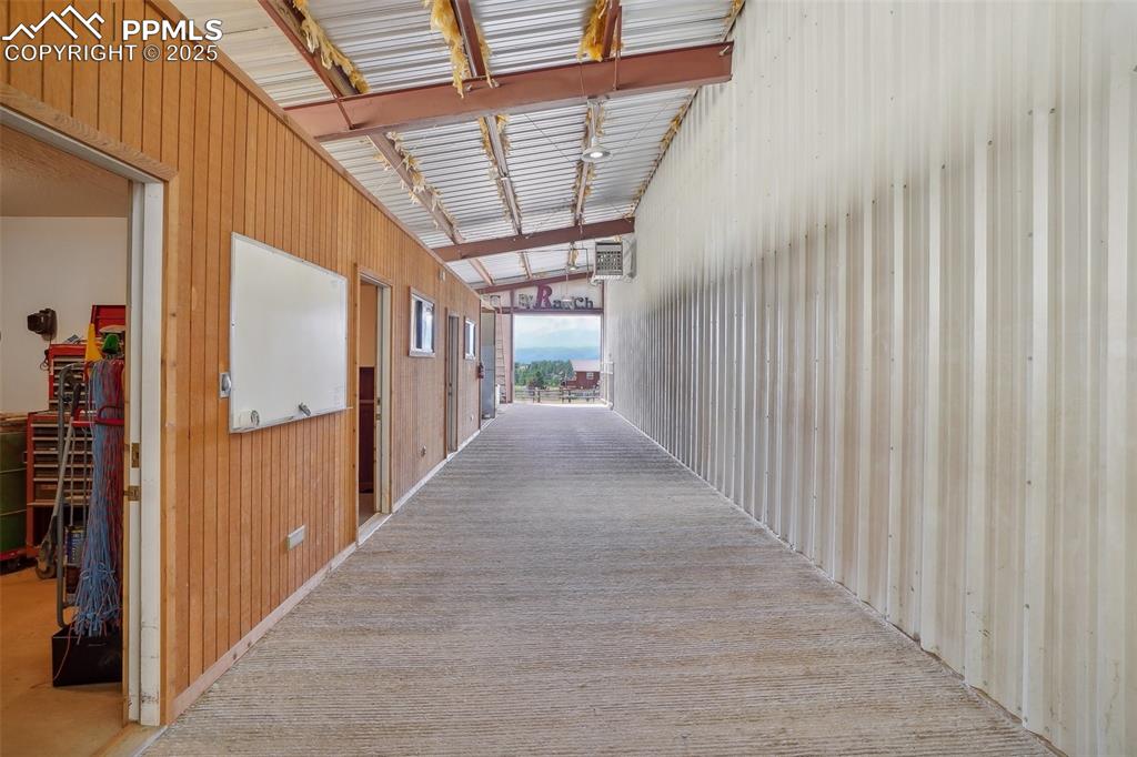 Image 37 of 49: indoor arena office, apartment, and tack room 