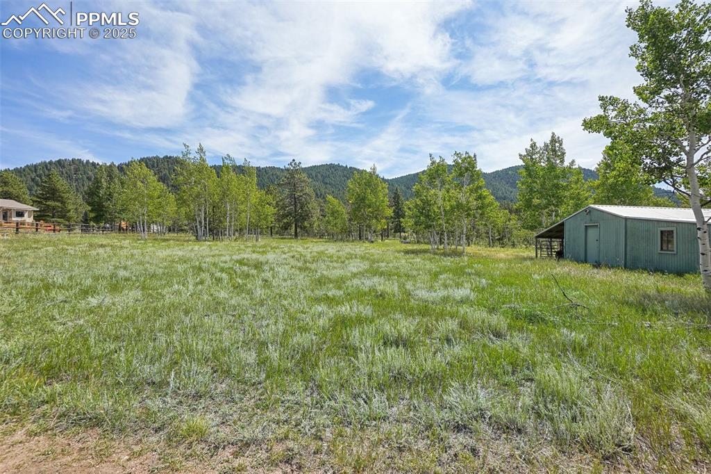 Image 38 of 49: pasture with RV hookup 