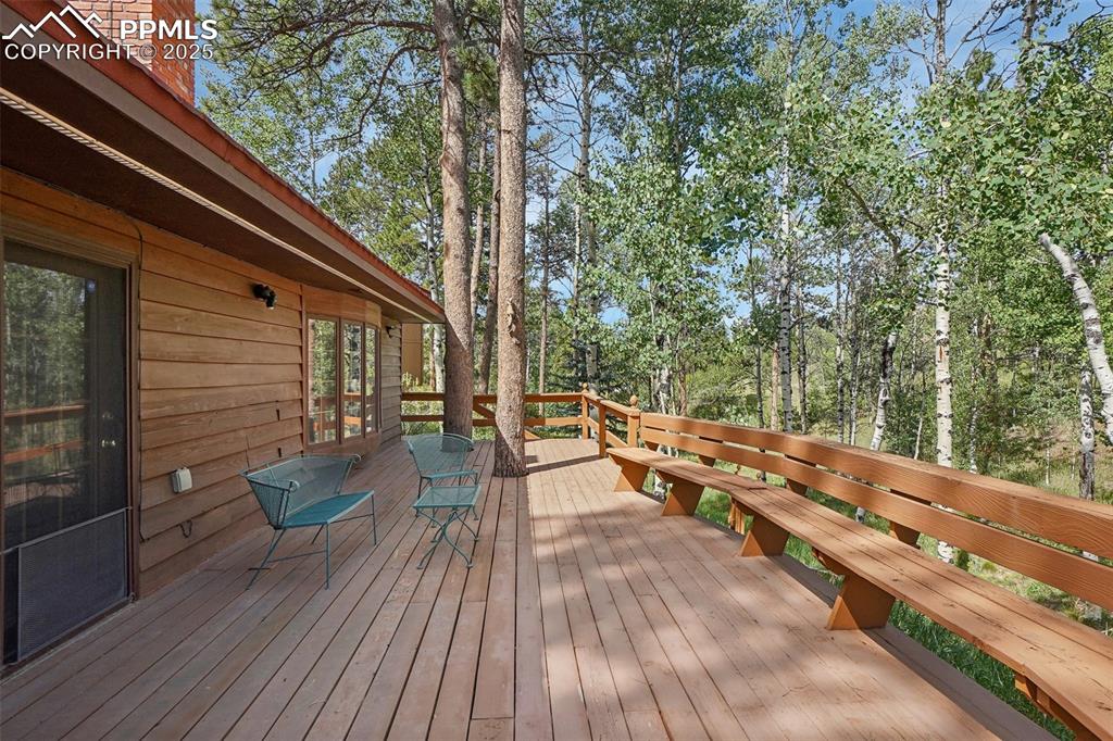 Image 6 of 49: back deck of main residence