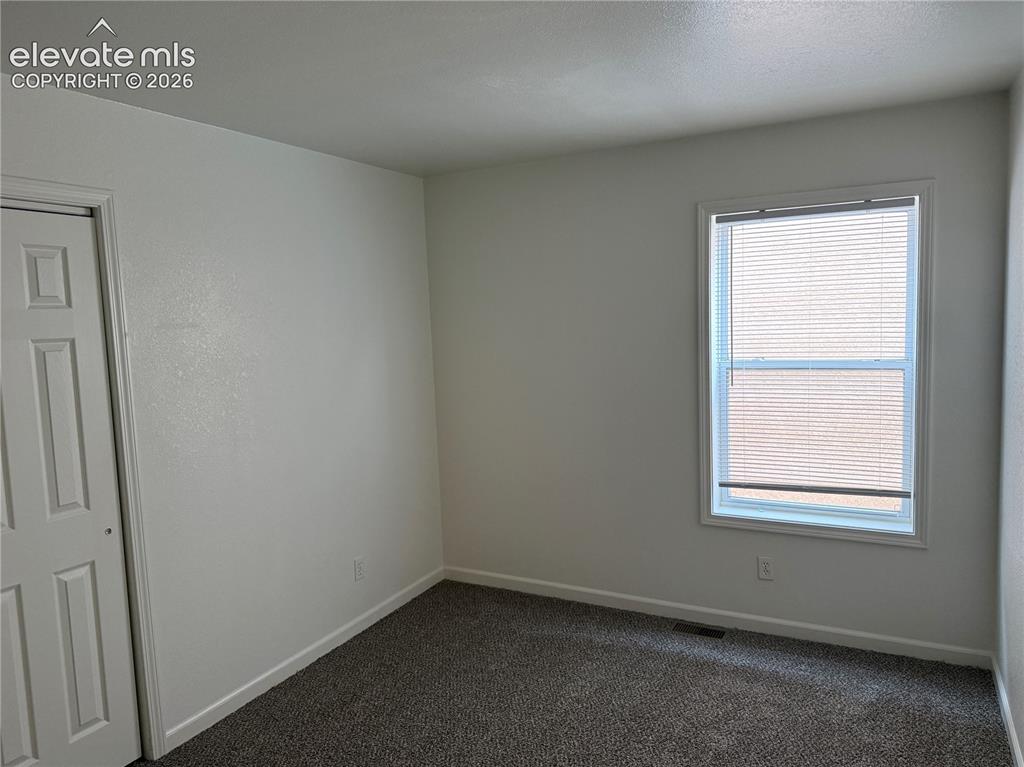 Image 9 of 14: Bedroom