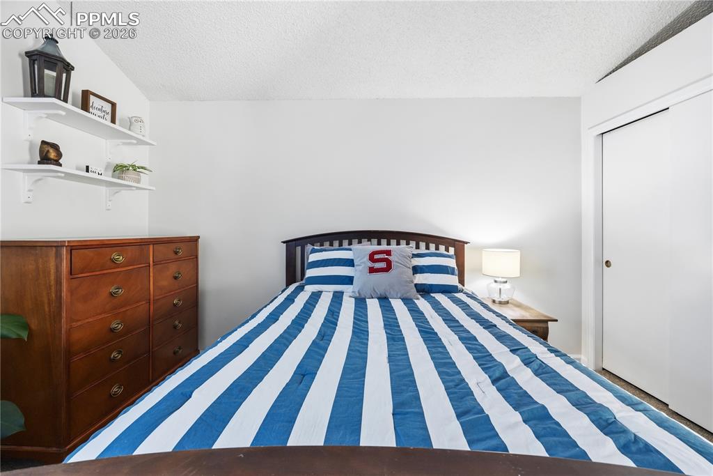 Image 28 of 38: Bedroom