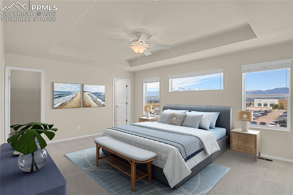 Image 14 of 41: Huge primary bedroom with dual closets. Virtually Staged