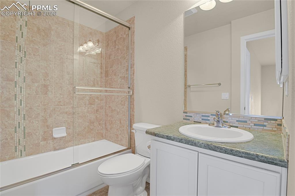 Image 17 of 41: Upper level hall bath