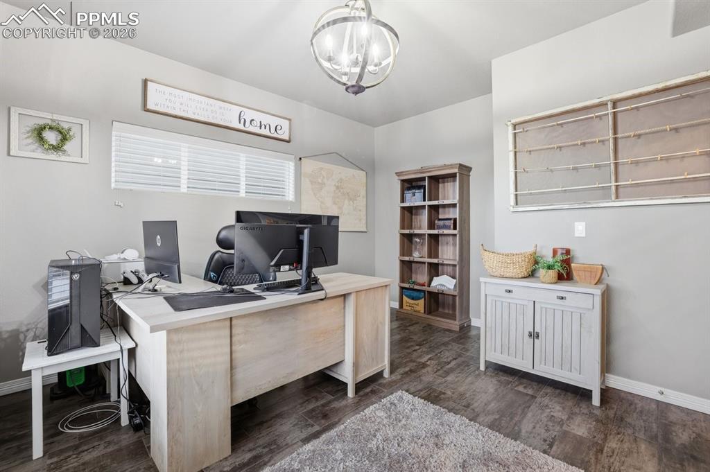 Image 16 of 49: Bedroom/office space on the main level