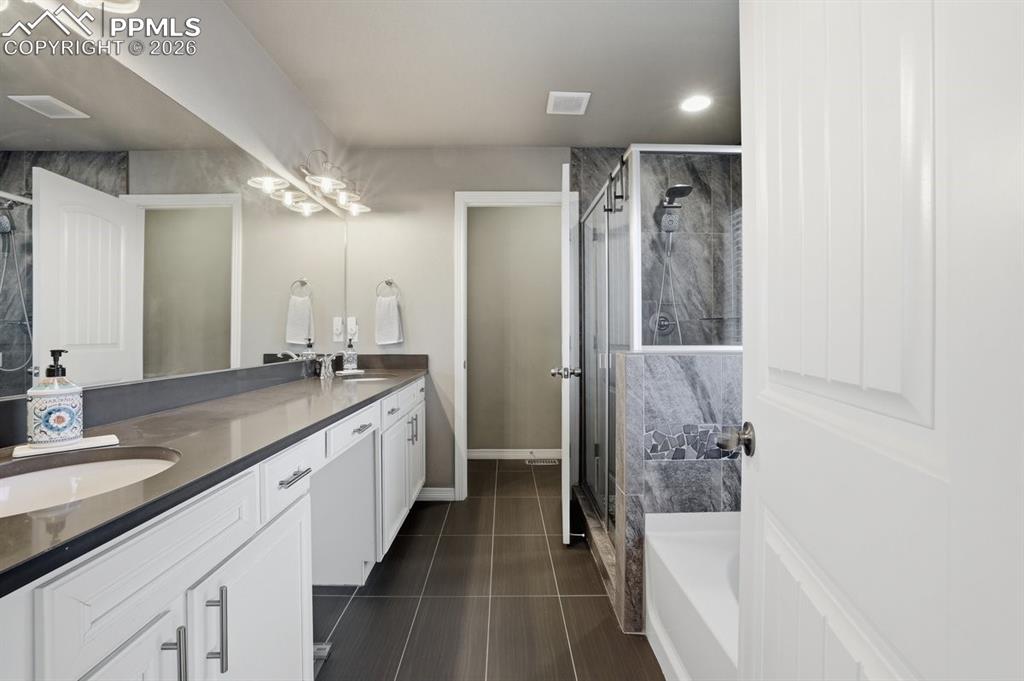 Image 25 of 49: Master Bathroom