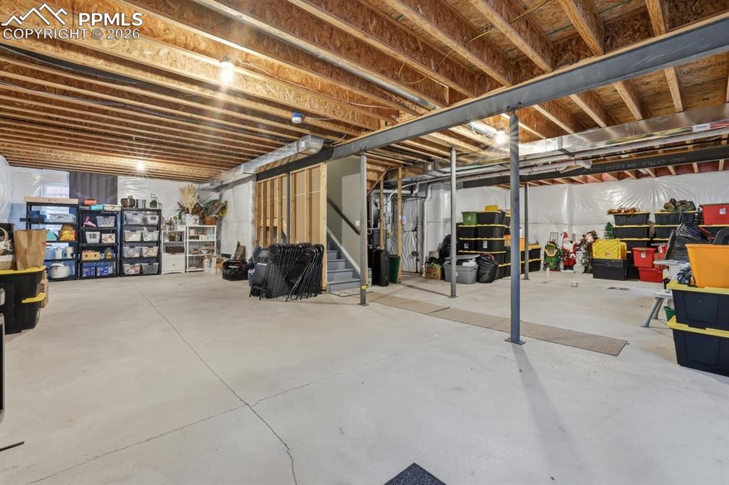 Image 37 of 49: 9 foot ceilings, pre-plumbed for future bathroom