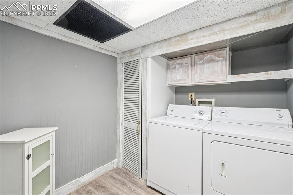 Image 23 of 36: Laundry room on the lower level