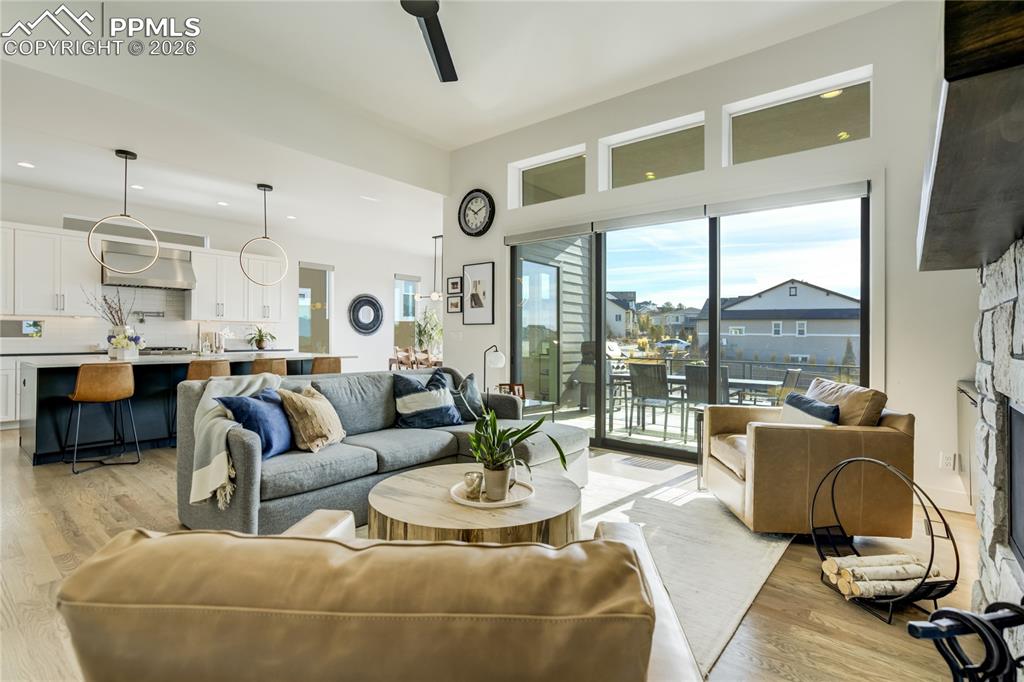 Image 17 of 50: Dramatic Western Window Wall Stacked Slider Frames Vista Views and Creates 