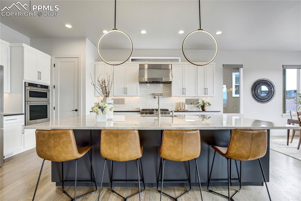 Image 9 of 50: Complemented by Wall Oven, Microwave, Dishwasher, and Bosch Wi-Fi Enabled R