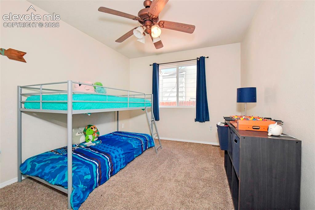 Image 17 of 26: 2nd bedroom on main level.