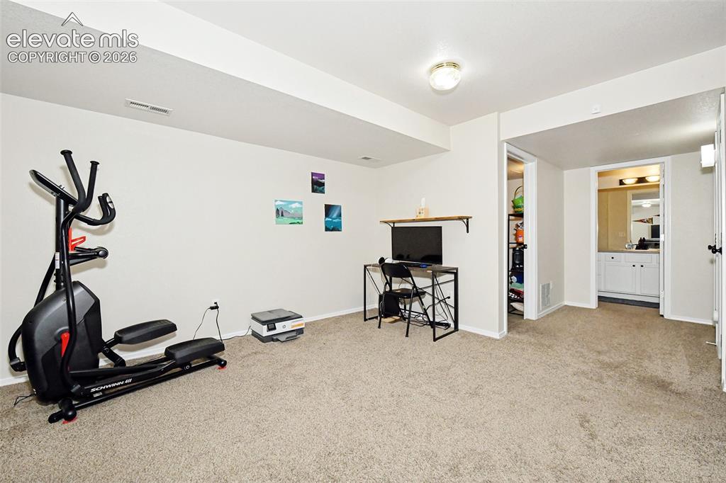 Image 22 of 26: Part of the large basement space.