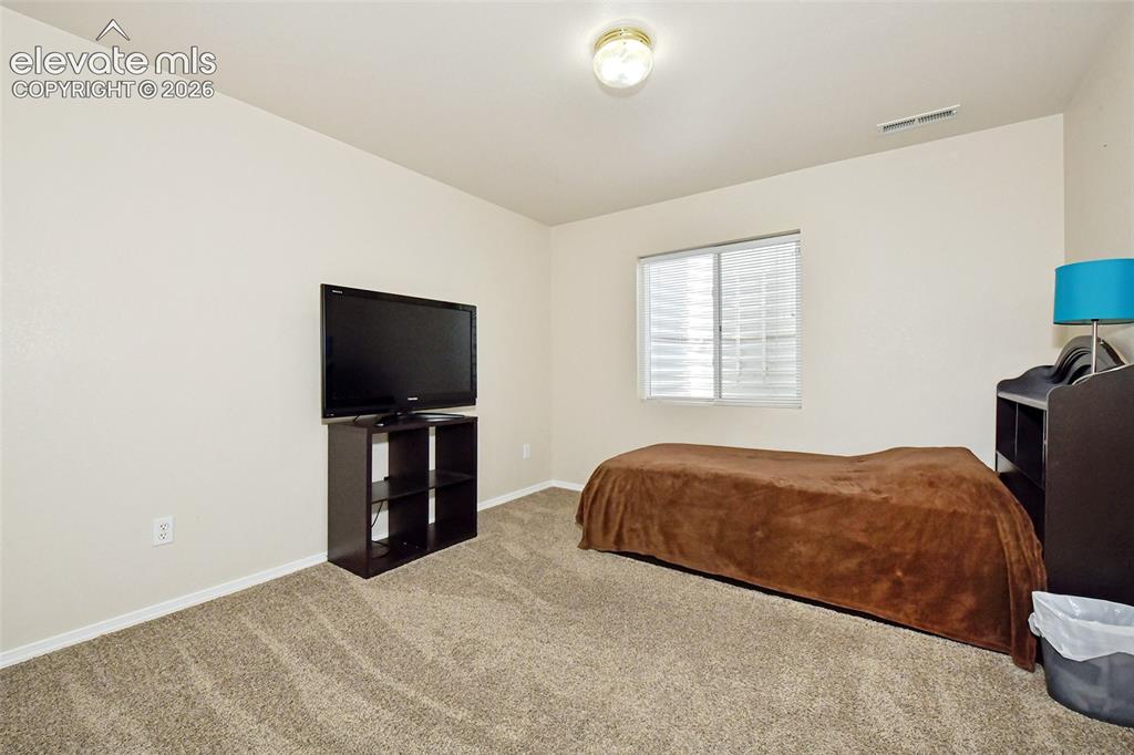Image 24 of 26: 3rd bedroom