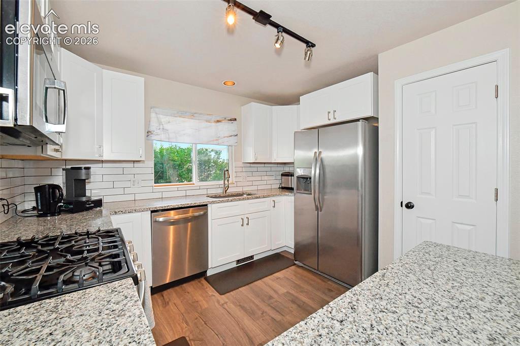 Image 5 of 26: New refrigerator in 2020. Nice pantry.