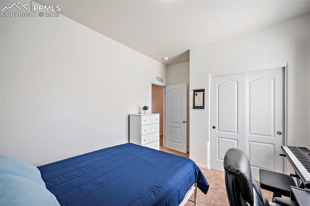 Image 23 of 26: Bedroom