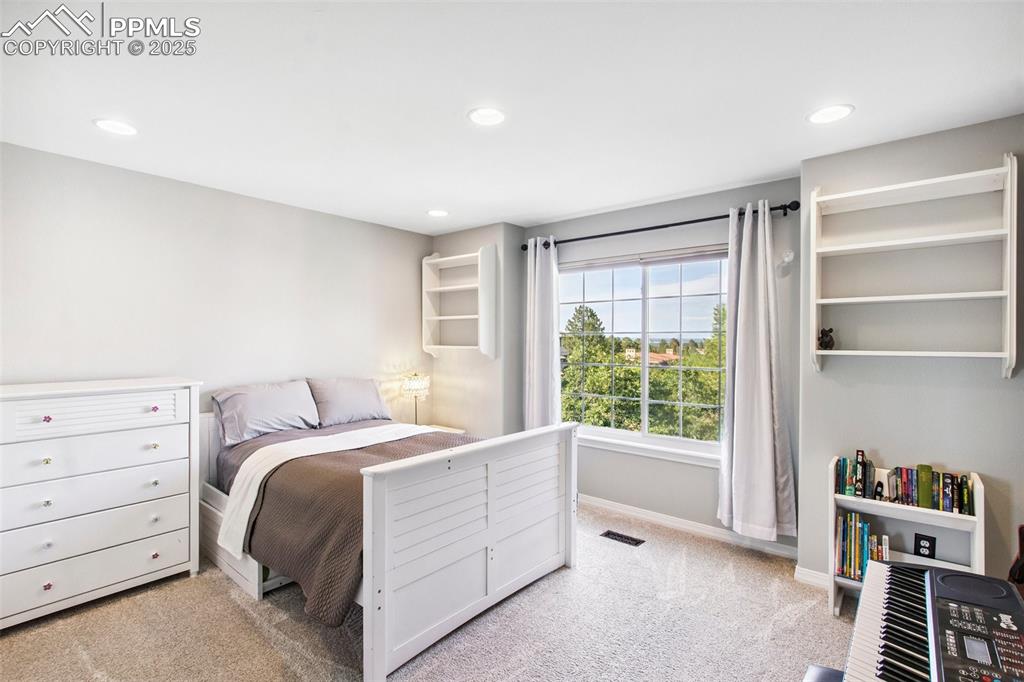 Image 24 of 44: Bedroom featuring carpet flooring and recessed lighting