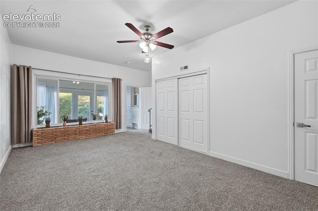 Image 16 of 31: Enclosed patio/mud room