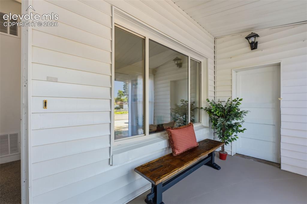 Image 18 of 31: Enclosed patio/sun room