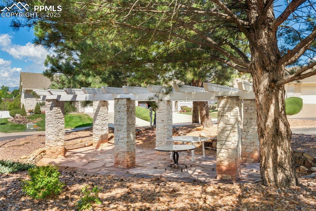 Image 34 of 34: Pergola in the center of the community 