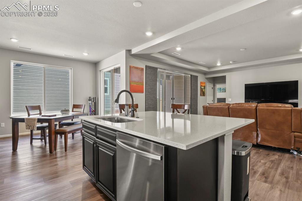 Image 2 of 27: Large center island with Quartz counters