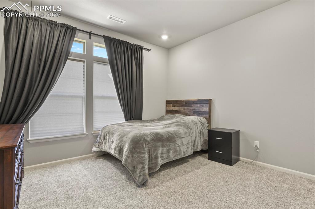 Image 21 of 27: 2nd bedroom.