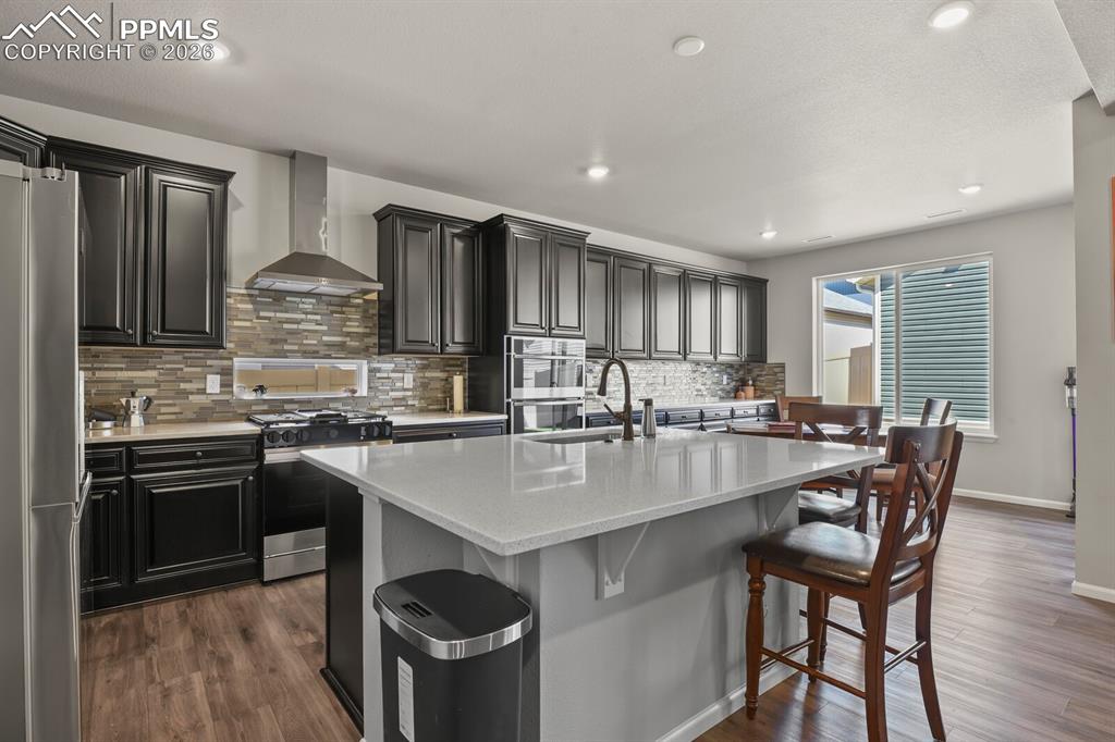 Image 7 of 27: Open concept kitchen and dining area.