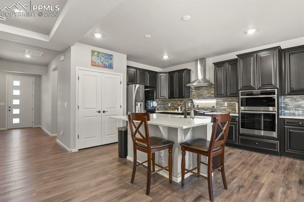 Image 8 of 27: Beautiful brand new stainless steel appliances.