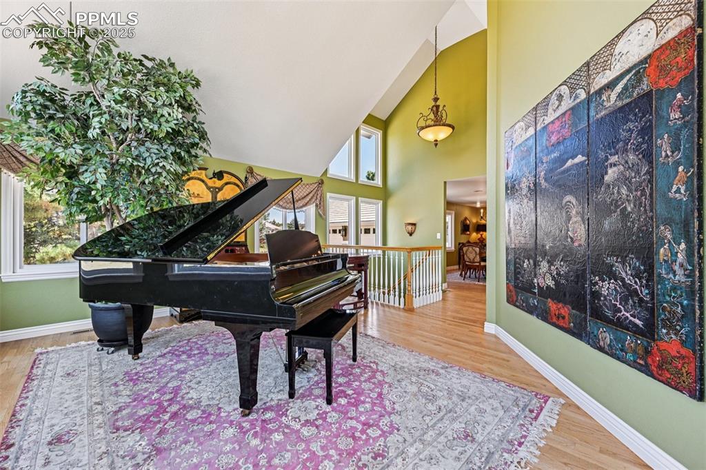 Image 14 of 50: Living Room with hardwood flooring