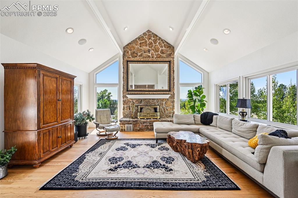Image 17 of 50: Great Room has a cozy fireplace