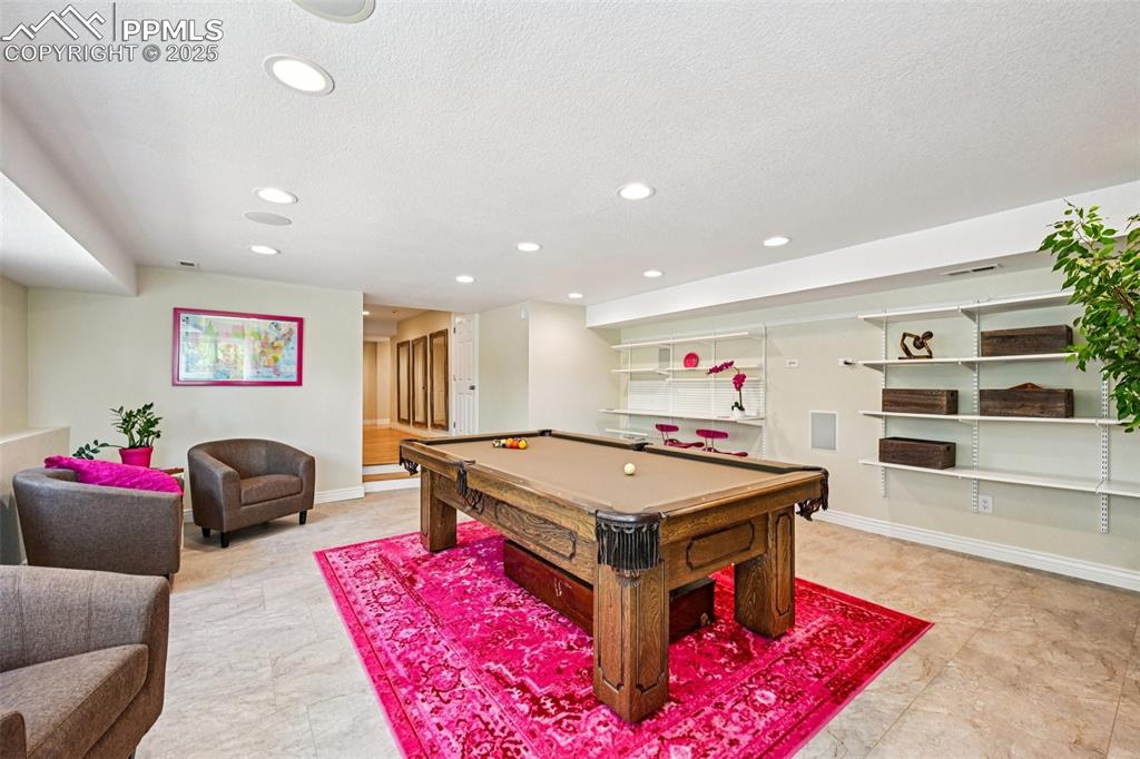 Image 39 of 50: Game/Family room filled with natural light